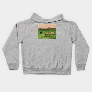 Horses grazing near the mountain range Kids Hoodie